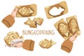 A set of Korean cuisine called Bungeoppang. Street Korean food in the form of fish in a mold. Pie in hand. Suitable for