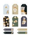 Set of labels with funny bear with hat and scarf and christmas tree.
