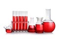 Set of laboratory glassware with red liquid on background Royalty Free Stock Photo
