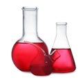 Set of laboratory glassware with red liquid on background Royalty Free Stock Photo