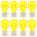 A set of lightbulbs with words on filament