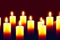 Set of lighted candles on dark background. Generative AI