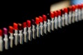 Set of lipstick. Different shades of red color. Set of lipstick, collection on black background. Visage and makeup for