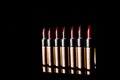 Set of lipsticks on black background. Royalty Free Stock Photo