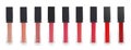 Set of liquid lipstick tubes on white Royalty Free Stock Photo