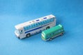 Scale models of colored small toy buses