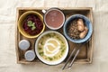 Set lunch in bowls in a wooden serving box. Food and catering concept. Royalty Free Stock Photo