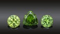 Set of luxury green transparent sparkling gemstones of various cut shape demantoids collage isolated on black background