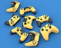 Set of lying gamer joysticks or gamepads on blue background