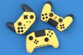 Set of lying gamer joysticks or gamepads on blue background