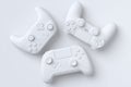 Set of lying gamer joysticks or gamepads on monochrome background