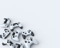 Set of lying gamer joysticks or gamepads on white background