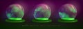 Set of magic crystal glass balls with flowing green smoke or steam inside.