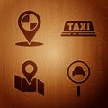 Set Magnifying glass and taxi car, Map pointer with taxi, Folded map with location marker and Taxi car roof on wooden Royalty Free Stock Photo