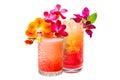 Set of Mai Tai cocktails in a classic tiki glass with crushed ice and orchids flowers