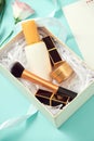 Set of make up cosmetics isolated on blue background Royalty Free Stock Photo
