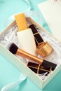 Set of make up cosmetics isolated on blue background Royalty Free Stock Photo