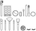 Set of makeup accessories in black lines on white background