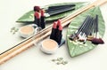 Set of makeup brushes and cosmetic products on table Royalty Free Stock Photo