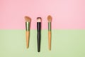 Set of Makeup Brushes on Pink Background Minimal Flat Lay Top View Royalty Free Stock Photo