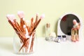 Set of makeup products and brushes on table Royalty Free Stock Photo