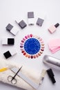 Set for manicure with gell polish bottles, LED lamp and accessoires on white background. flat lay