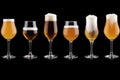 Set of many beer glasses with different beer isolate on black background. Royalty Free Stock Photo