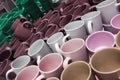 Set of many empty cups different colors abstract background Royalty Free Stock Photo