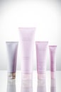 Set of Mary Kay cosmetics isolated on gradient background.