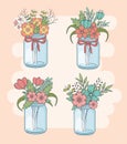 Set of mason jars with floral decorations