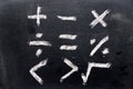 Set of math symbol draw by chalk on black board