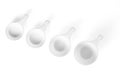 Set of measuring cups lined up, top view, white background Royalty Free Stock Photo
