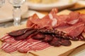 Set of meat cold cuts on wooden table Royalty Free Stock Photo