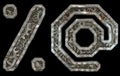 Set of mechanical alphabet made from rivet metal with gears on black background. Symbol percent and at. 3D