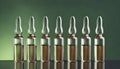 Set of medical ampoules in a line, against gradient background