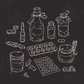 Set of medical drugs, bottles of medicines and tablets on black background