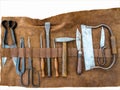 Medieval medical surgery tools wrapped in leather