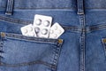 A set of medicines and vitamins in blisters with pills in the back pocket of jeans Royalty Free Stock Photo