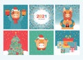 Set of merry Christmas and happy New year greeting cards and banners. Funny bulls with gifts, Christmas tree, pine Royalty Free Stock Photo