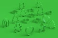 Set of metal cookie cutters for homemade Christmas biscuit on green monochrome Royalty Free Stock Photo