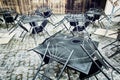 Set of metal garden chairs and tables in restaurant, it is close Royalty Free Stock Photo