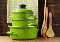 Set of metal green pots cookware Royalty Free Stock Photo