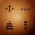Set Microphone, Firework, Cake and Carnival garland with flags on wooden background. Vector