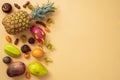 A set of mix tropical fruits on a beige background. With space for design. Exotic healthy eating. Seasonal organic raw Royalty Free Stock Photo