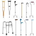 Set of mobility aids including walker, walking sticks and crutches. Telescopic metal canes, wooden cane, cane with additional