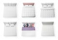 Set of modern beds with comfortable soft mattresses on white background