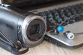 Set of modern computer devices - laptop, headphones and camcorder Royalty Free Stock Photo