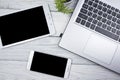 Set of modern computer devices - laptop, tablet and phone close up Royalty Free Stock Photo