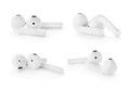 Set of modern wireless earphones on white