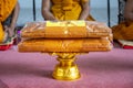Set of monk`s robes placed on the pedestal Royalty Free Stock Photo